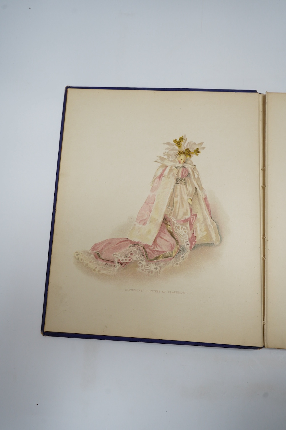 Low, Frances H. - Queen Victoria's Dolls. pictorial title, num. coloured illus. (mostly full page) and other text illus. (by Alan Wright); original gilt pictorial cloth, ge. and gold patterned e/ps., 4to. 1894